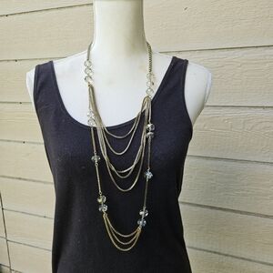 long gold tone layered box chain necklace with crystal stations